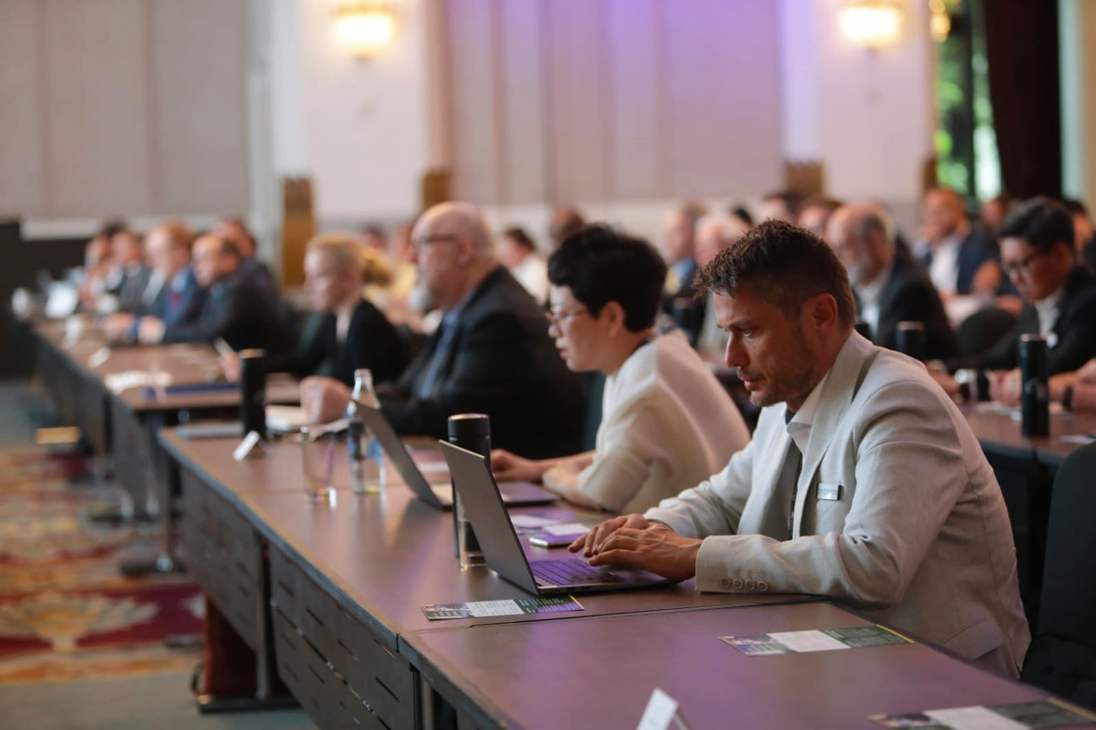 Donald Scholz at a conference. Decorative image.